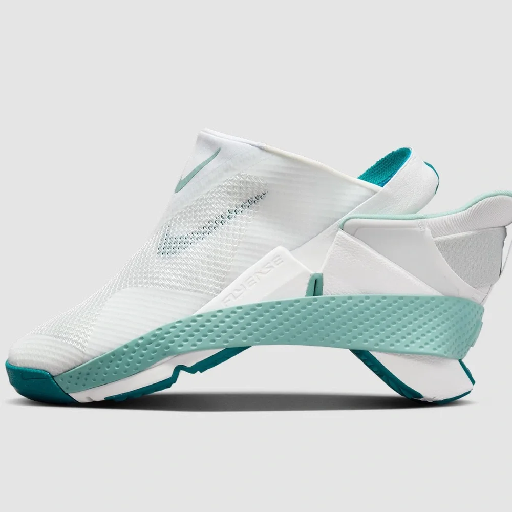 Nike Women’s Slip-On Sneakers in White and Teal